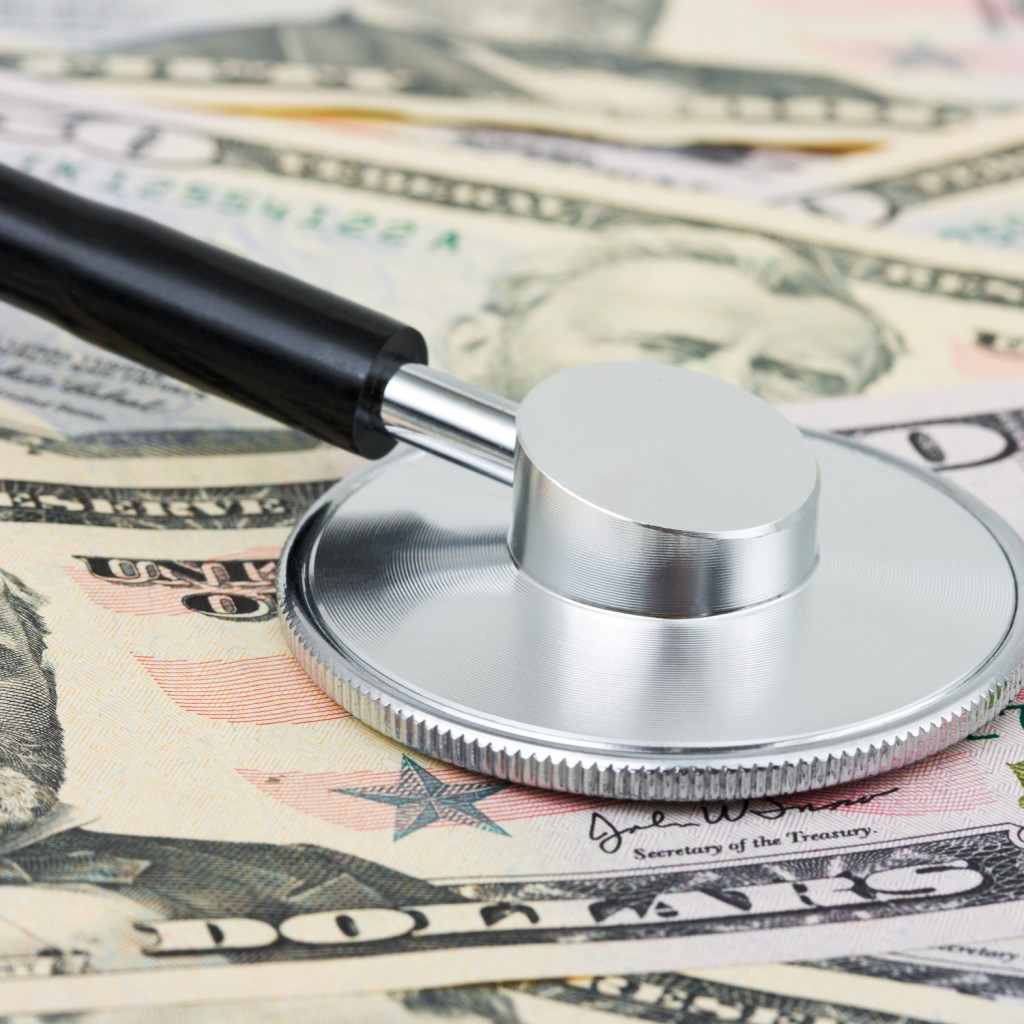 Stethoscope on money background