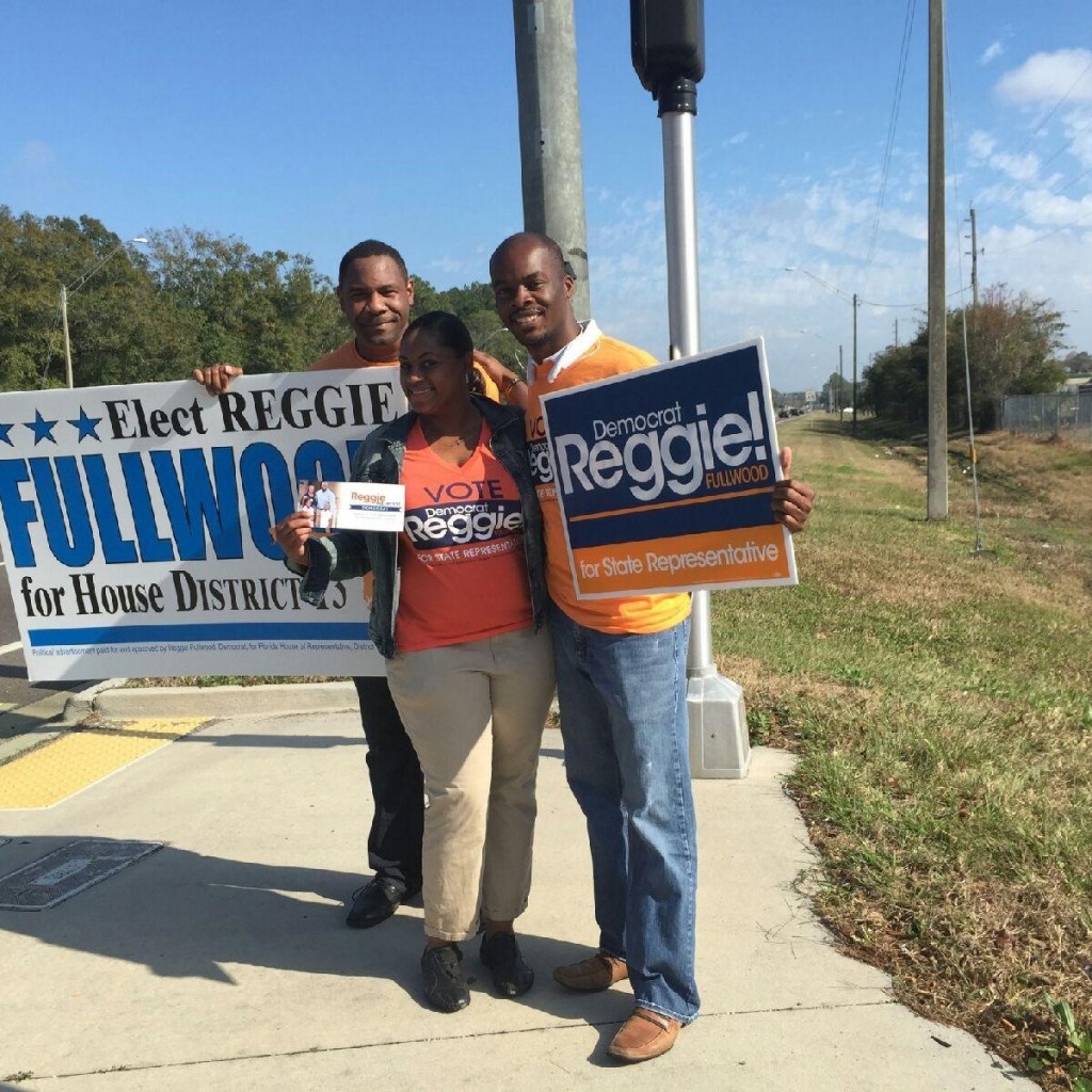 Supporters-wave-signs-in-support-of-Reggie-Fullwood.-photo-credit-Jackie-Boyd-1024x1024.jpg
