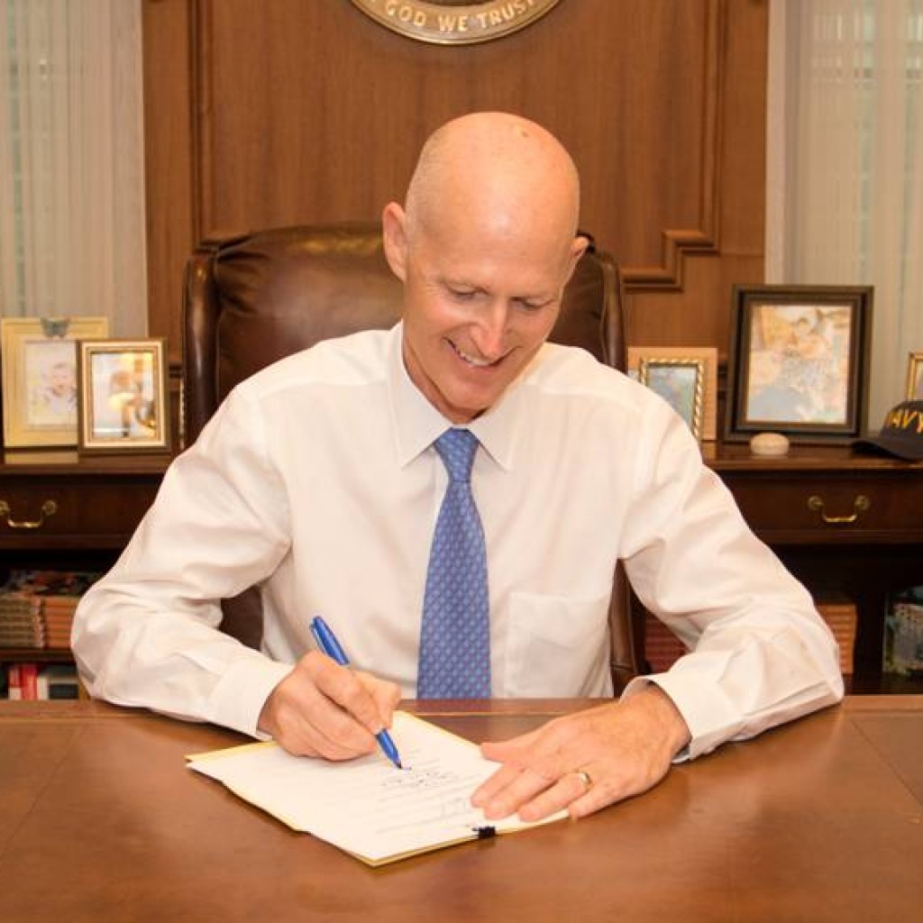 scott, rick - signing budget