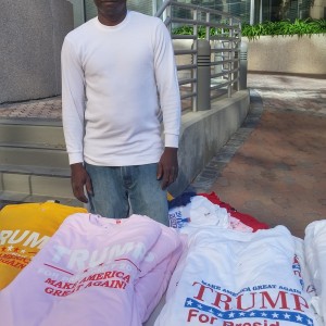 T-Shirt vendor James Quattelbaum. "I'm a Democrat, and I'm voting for Bernie Sanders. But I've got to make a living." 
