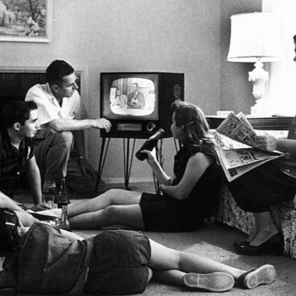 the-eye-of-faith-on-tv-vintage-photo-of-family-watching-television-1958