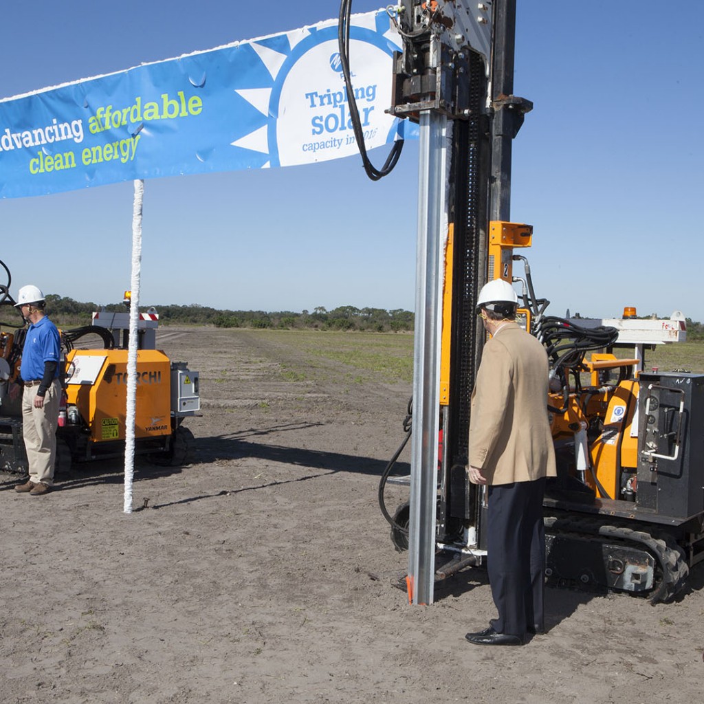 Agriculture Commissioner Adam Putnam, L, and FPL President and CEO Eric Silagy simultaneously pull the switches on the first two beams at the Manatee Solar Energy Center in Parrish. 