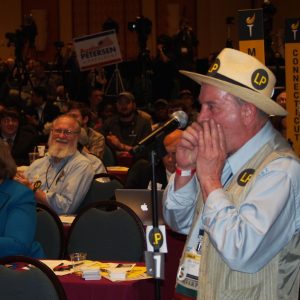A delegate gives a harmonica statement.