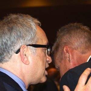 Radical candidate Marc Feldman consults Johnson.