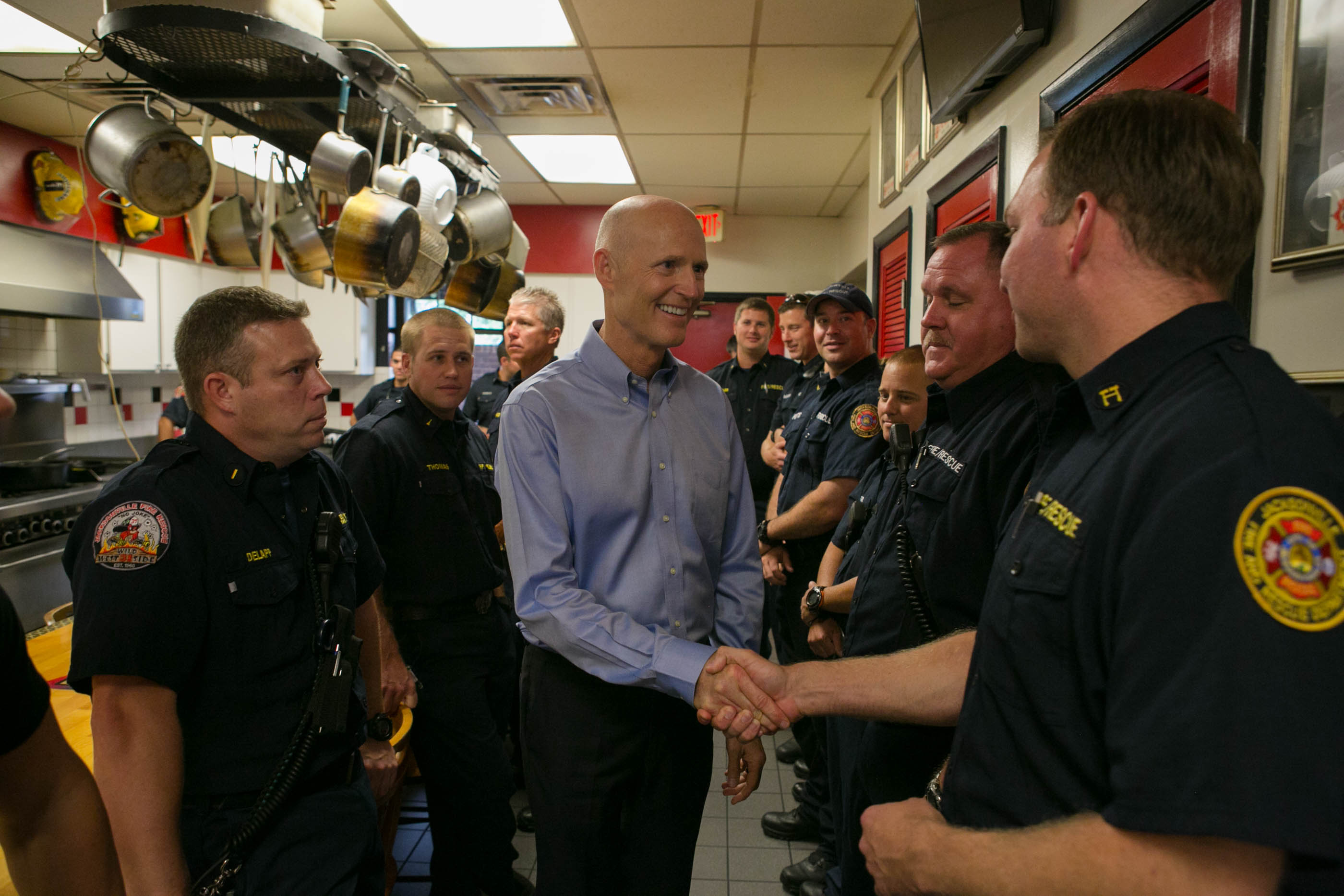 Gov. Rick Scott meets with Jacksonville first responders to thank them for their work during Tropical Storm Colin. (Photo courtesy of Governor's Office.)