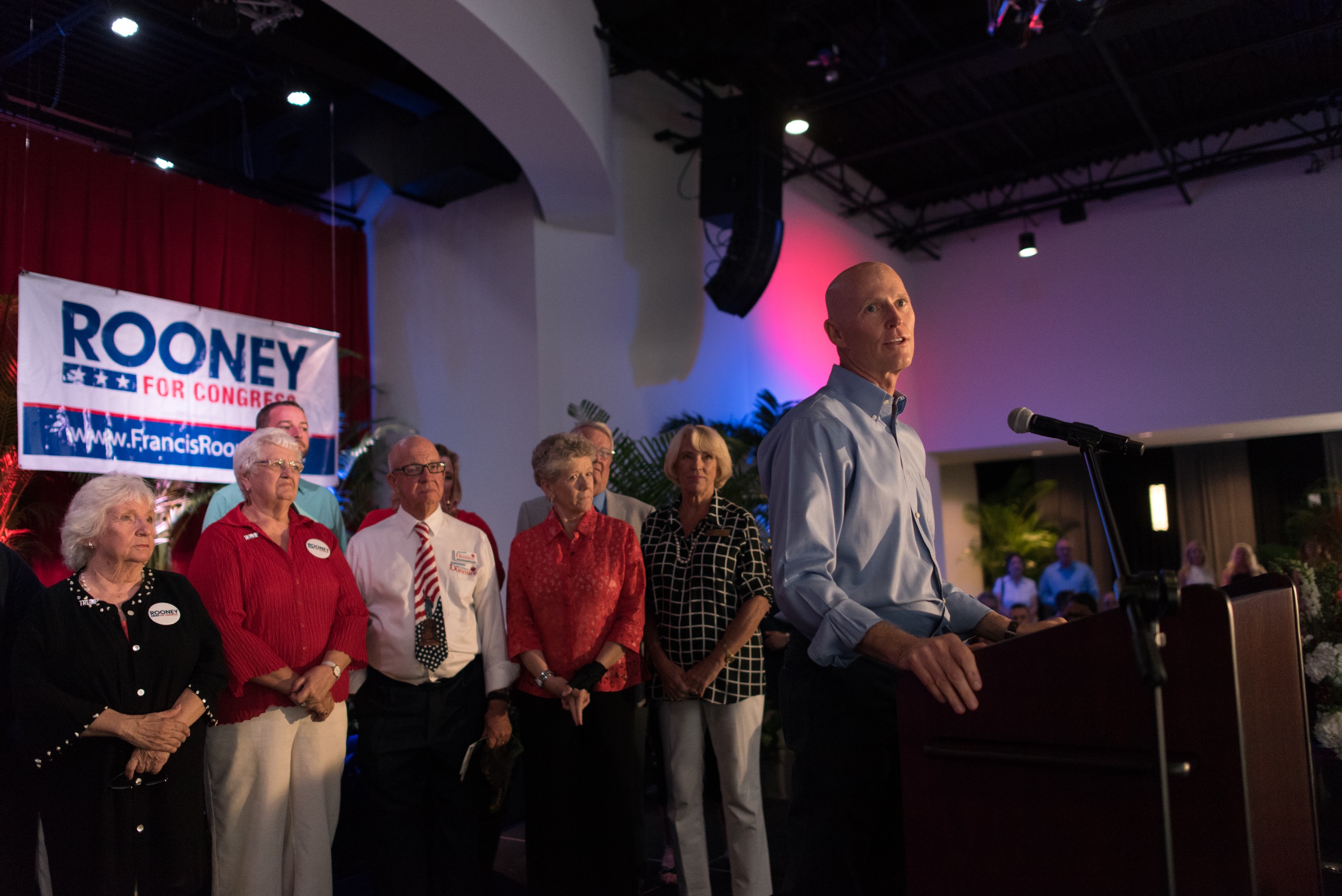 Scott speaking at Rooney event