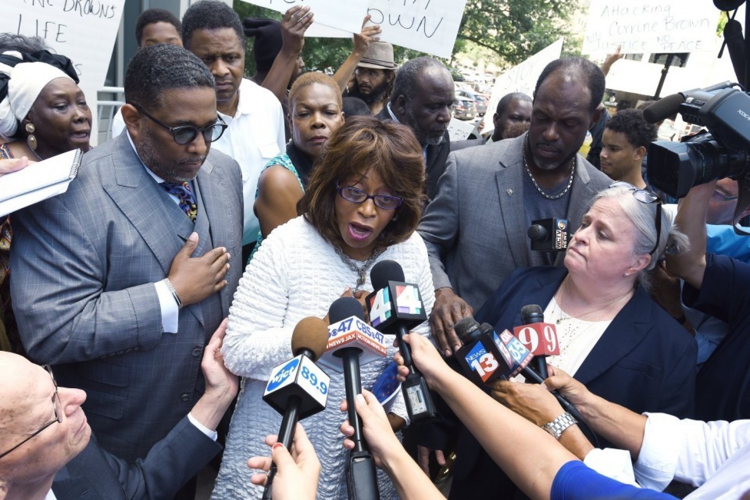 brown, corrine - confronts the press