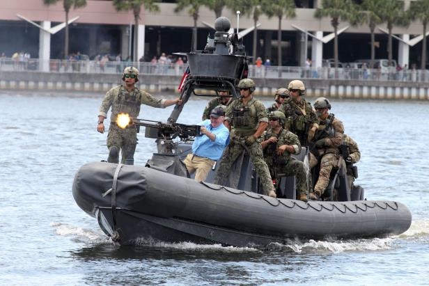 tampa-mayor-bob-buckhorn-fires-a-50-caliber-machine-gun-from-a-rigid-hull-inflatable-boat-after-bein_275352_