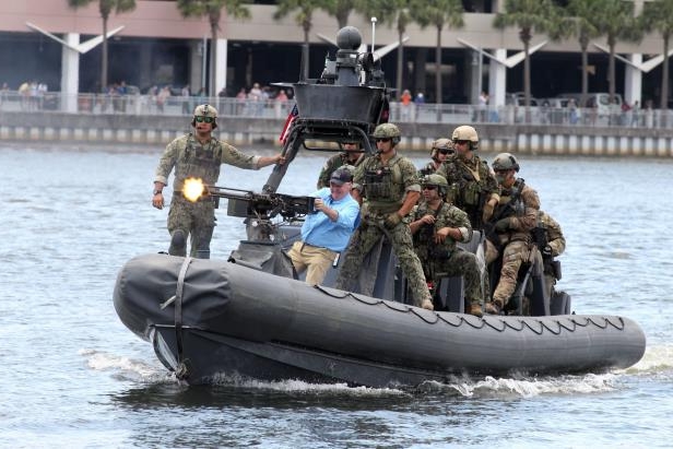 tampa-mayor-bob-buckhorn-fires-a-50-caliber-machine-gun-from-a-rigid-hull-inflatable-boat-after-bein_275352_.jpg