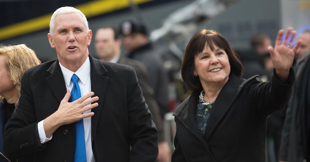 Mike_Pence_and_Karen_Pence_walking_the_parade_route