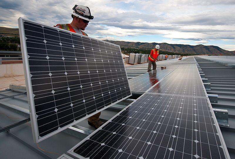 installing_solar_panels__7336033672_