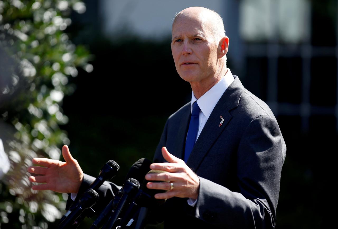 FILE PHOTO:    Florida Governor Rick Scott speaks about hurricane relief measures for Florida and Puerto Rico at the White House in Washington