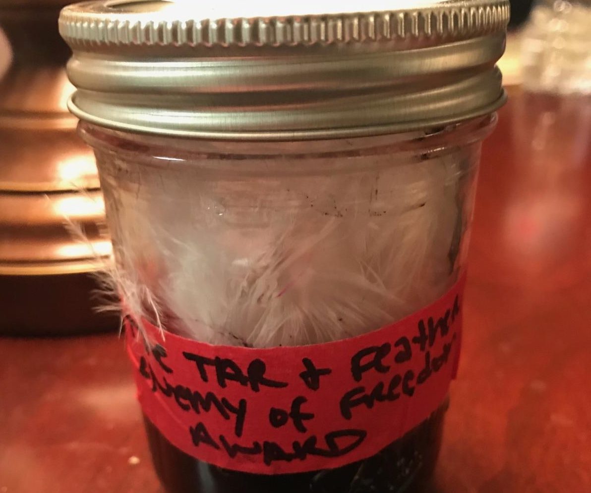 Senate tar and feather jar