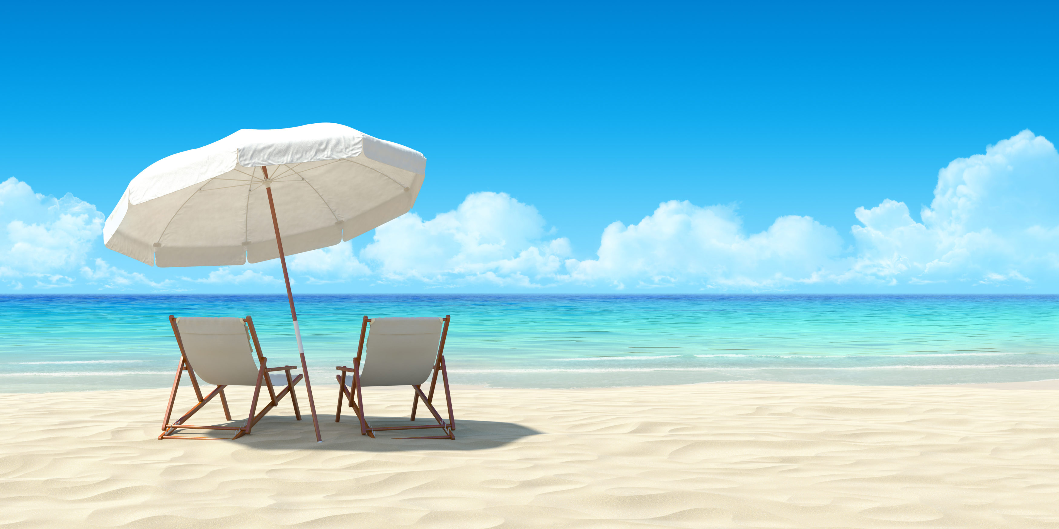 Chaise lounge and umbrella on sand beach.