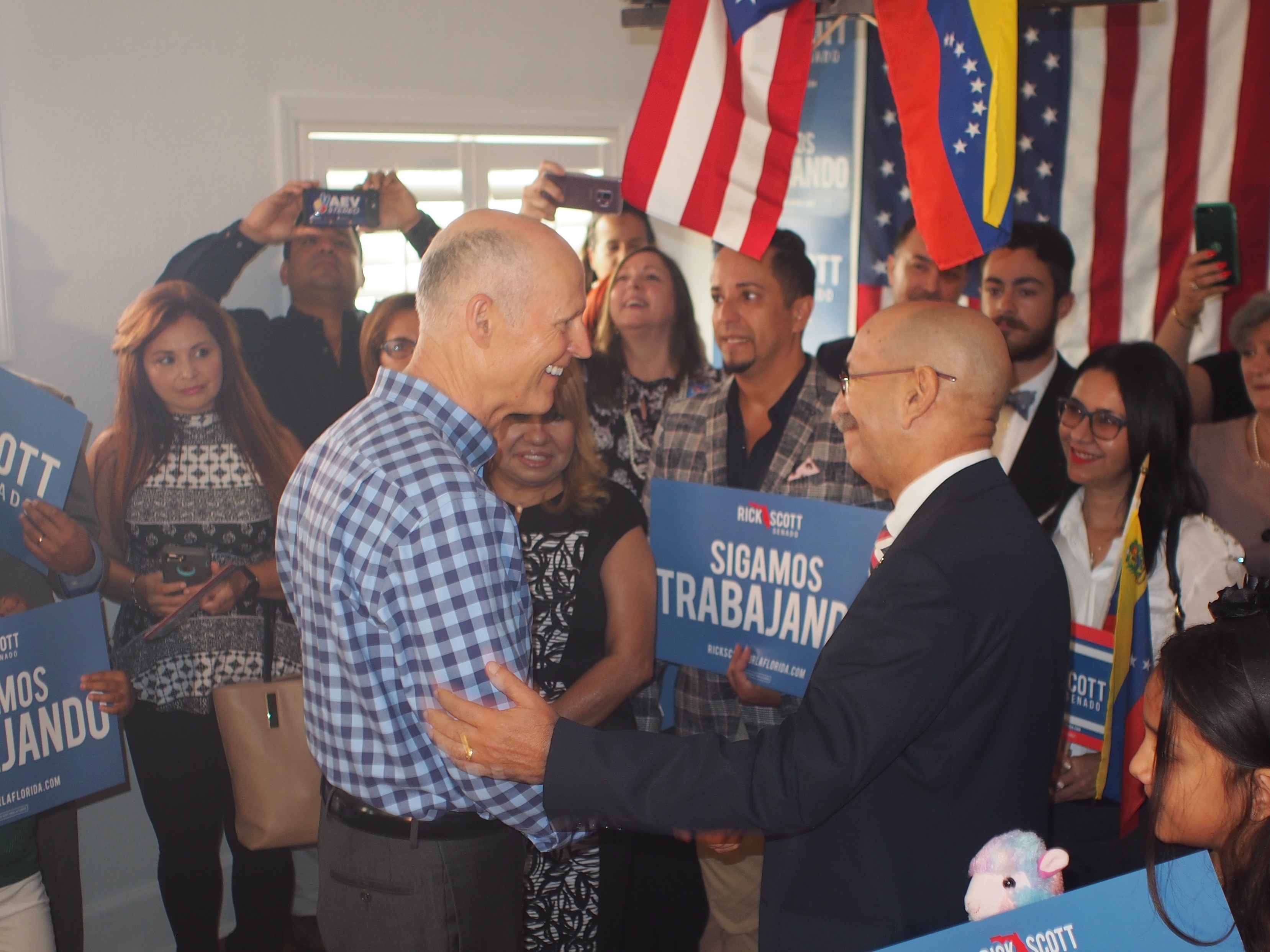 Rick Scott and William Diaz