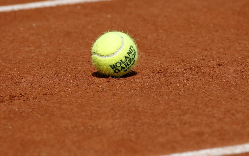 AP Photo - Tennis ball on court