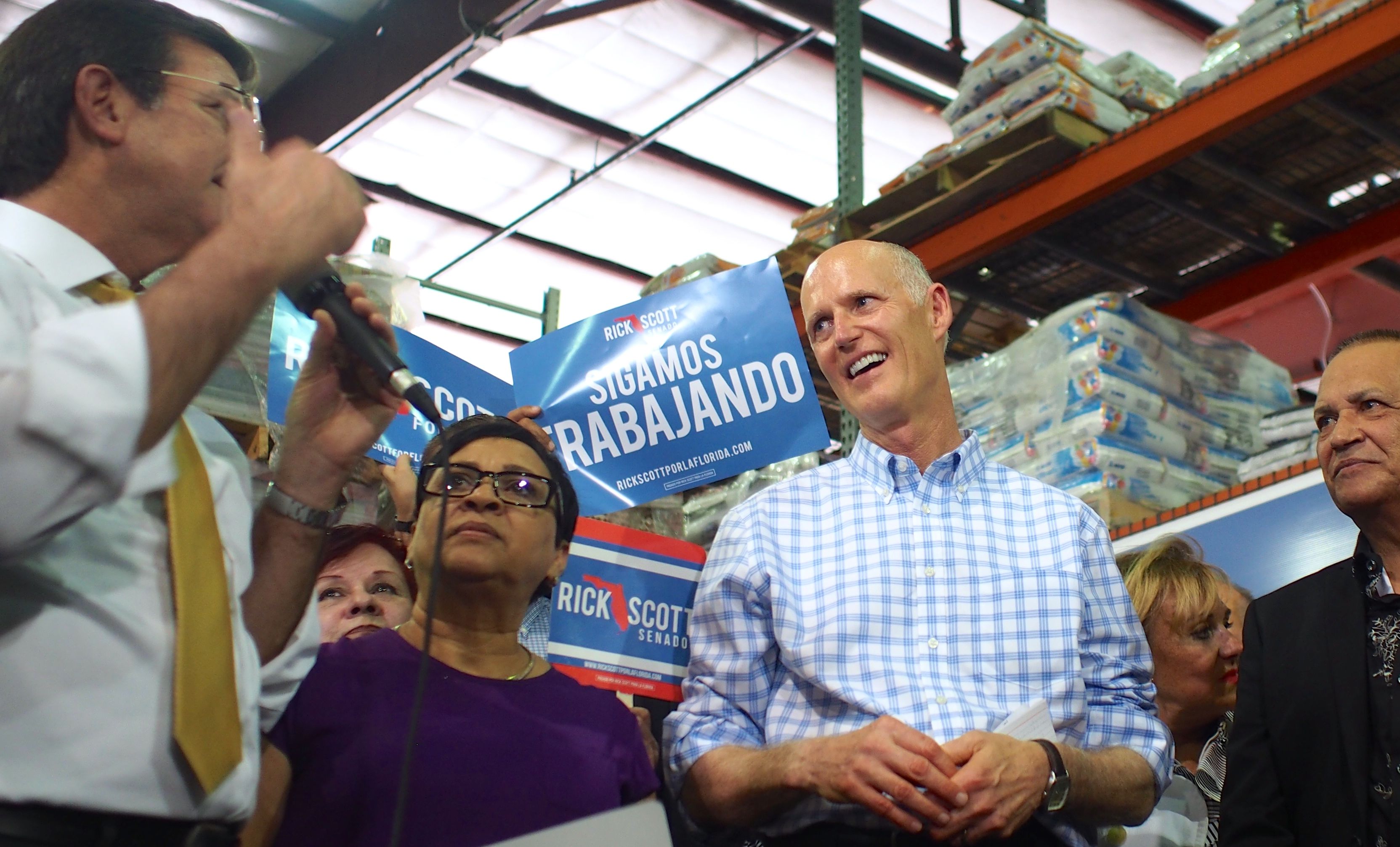 Rick Scott and Luis Rivera Marín