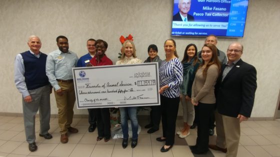 from left to right – Tax Collector Mike Fasano; Supervisor Carlton Francis; Customer Service Representative Tyler Albritton; Assistant Manager Harriette Sorezza; Abby Cox, Friends of Animal Services; Supervisor Janice Reda; Darlene Green, Friends of Animal Services; Supervisor Mikala Ballard; Customer Service Representative Lauren Mazzone; Mike Shumate, Manager of Pasco Animal Services & Michael Cox, Friends of Animal Services.