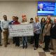 from left to right – Tax Collector Mike Fasano; Supervisor Carlton Francis; Customer Service Representative Tyler Albritton; Assistant Manager Harriette Sorezza; Abby Cox, Friends of Animal Services; Supervisor Janice Reda; Darlene Green, Friends of Animal Services; Supervisor Mikala Ballard; Customer Service Representative Lauren Mazzone; Mike Shumate, Manager of Pasco Animal Services & Michael Cox, Friends of Animal Services.