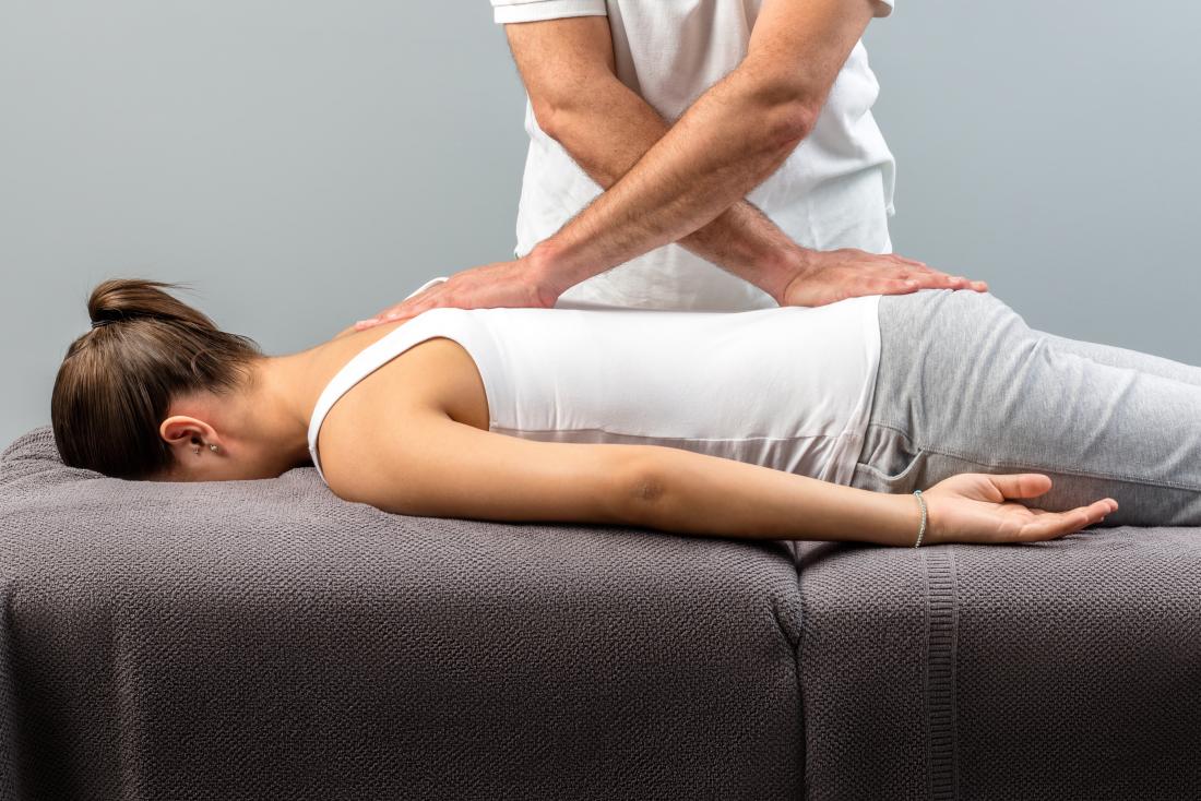 chiropractor-working-on-woman-s-back.jpg