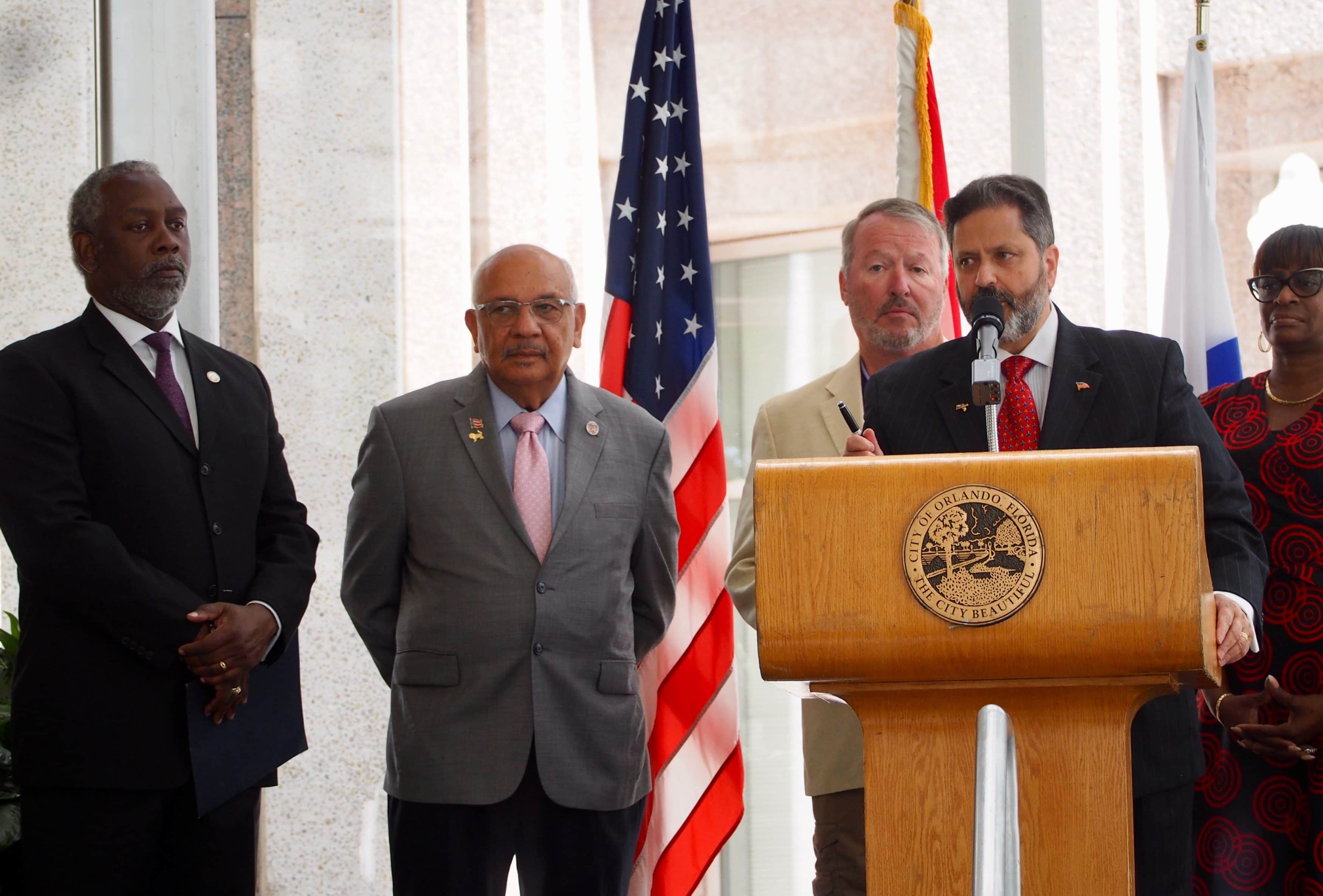 Dominic Calabro with Orange County Mayor Jerry Demings, state Sen. Victor Torres, and Orlando Mayor Buddy Dyer