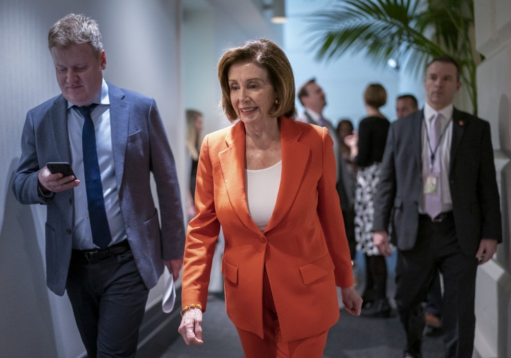 Speaker of the House Nancy Pelosi, D-Calif., arrives for a meeting with fellow Democrats on Capitol Hill in Washington, Wednesday, Feb. 26, 2020. (AP Photo/J. Scott Applewhite)