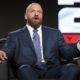 FILE - In this Jan. 9, 2018, file photo, Paul "Triple H" Levesque participates in the "WWE Monday Night Raw: 25th Anniversary" panel during the NBCUniversal Television Critics Association Winter Press Tour in Pasadena, Calif. While real sports have shut down in the wake of the coronavirus pandemic, WWE has pressed on and is set to run this weekend its first WrestleMania in an empty arena. “We just feel like it is the right time,” WWE executive Levesque said. (Photo by Willy Sanjuan/Invision/AP)