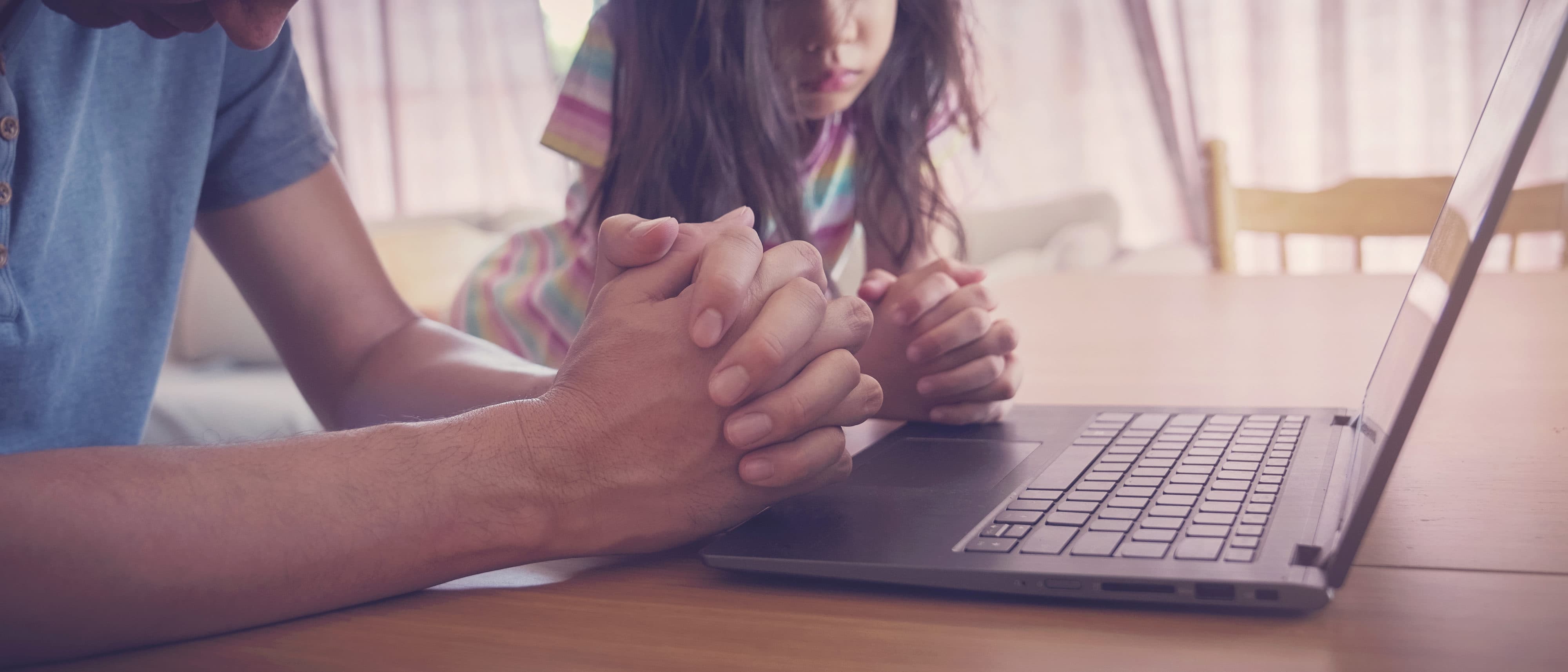praying hands, family praying with laptop, and parent and kid worship online together at home, streaming online church service, social distancing, new normal  concept