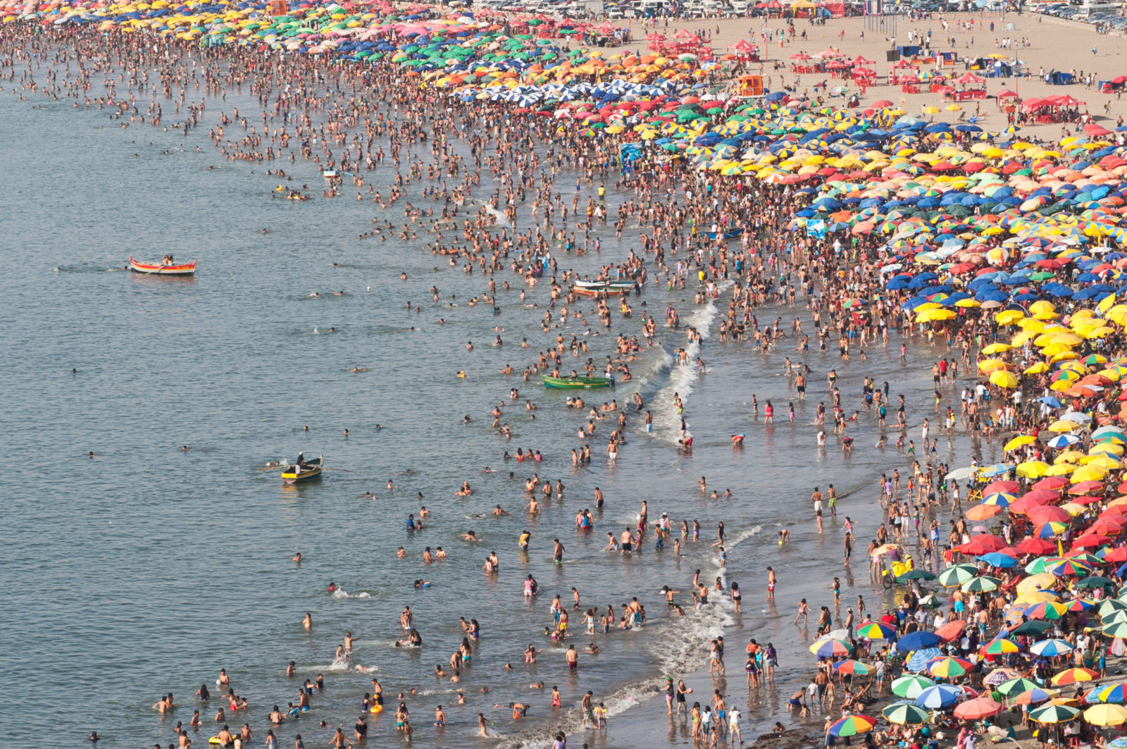crowded-beach-scaled-e1588882094948.jpeg