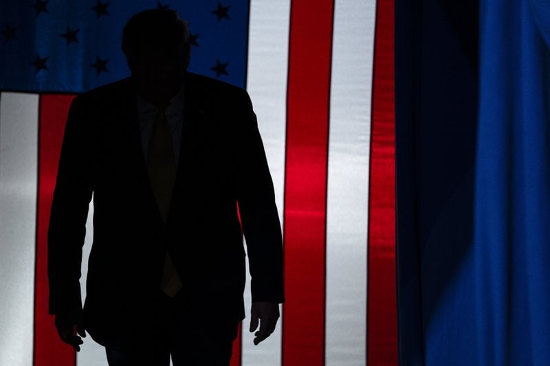 trump, donald - shadow on american flag