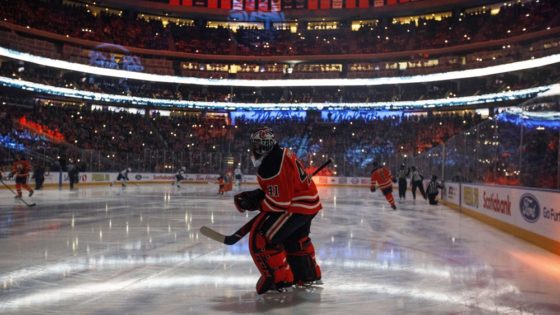 FILE - In this Feb. 20, 2020, file photo, Edmonton Oilers goalie Mike Smith warms up for the team's NHL hockey game against the Winnipeg Jets in Edmonton, Alberta. Deputy Commissioner Bill Daly told The Associated Press on Sunday, July 5, that the NHL and NHL Players’ Association have agreed on protocols to resume the season. Daly said the sides are still negotiating a collective bargaining agreement extension. A CBA extension is still crucial to the process. (Jason Franson/The Canadian Press via AP, File)