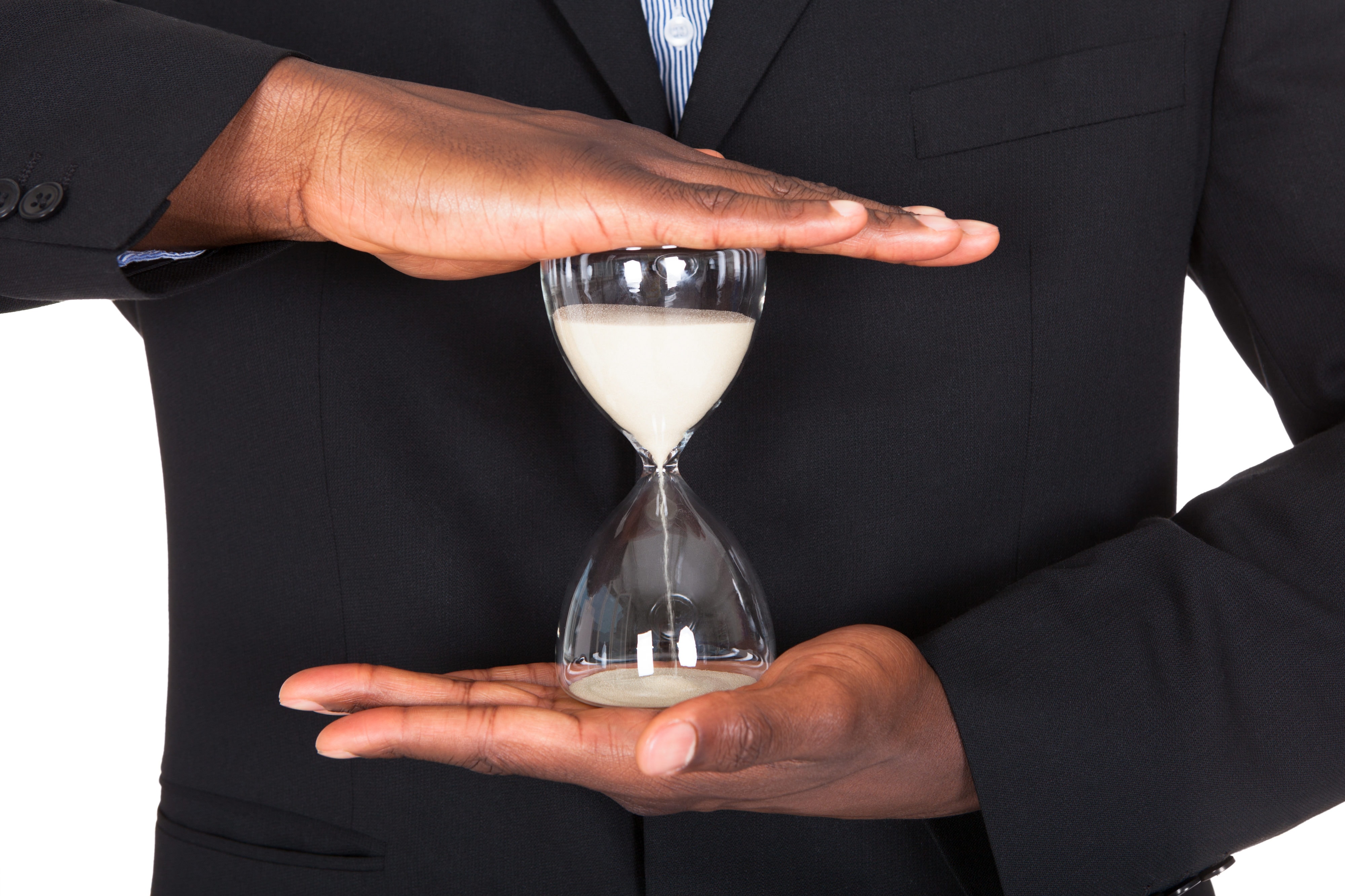 Businessman Holding Hourglass