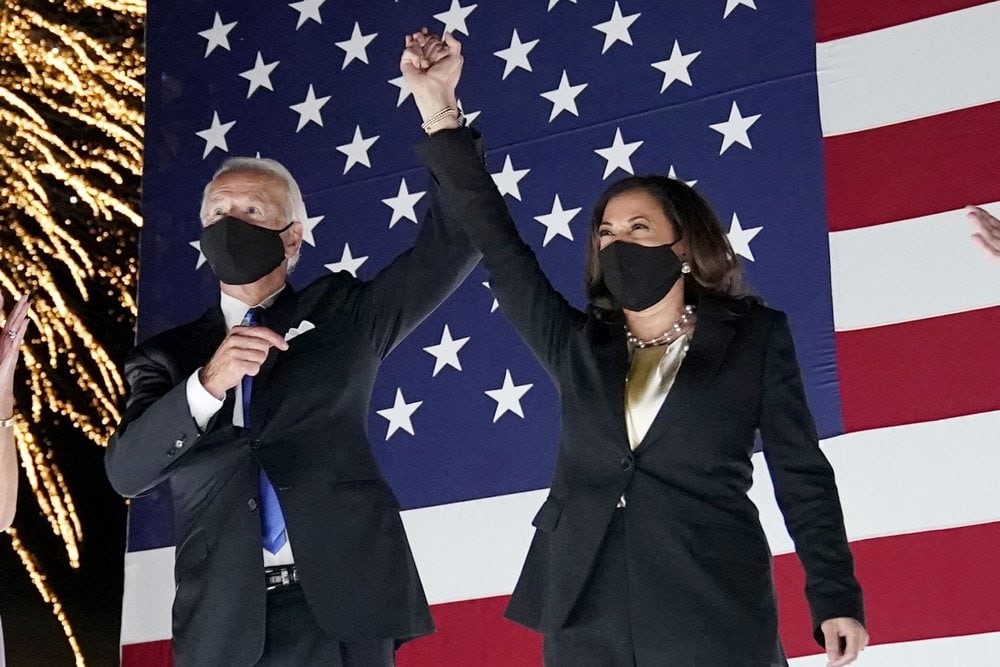 Democratic presidential candidate former Vice President Joe Biden and his running mate Sen. Kamala Harris, D-Calif., watch fireworks during the fourth day of the Democratic National Convention, Thursday, Aug. 20, 2020, at the Chase Center in Wilmington, Del. (AP Photo/Andrew Harnik)