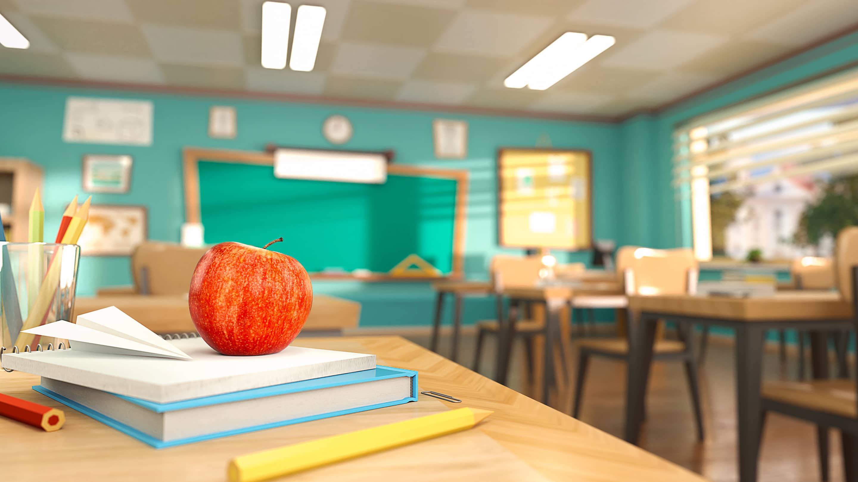 Cartoon style school elements - book, pen, pencils and red apple on desk in empty classroom closed on qurantine covid-19. 3D rendering illustration. Back to school design template.
