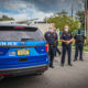 Police officers stand by during a protest in New Port Richey, Florida on Aug. 23, 2020.