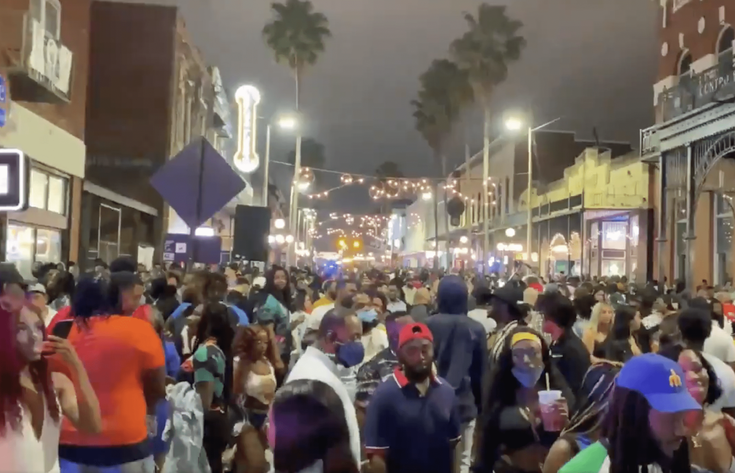 Thousands line Ybor City streets maskless night before Super Bowl