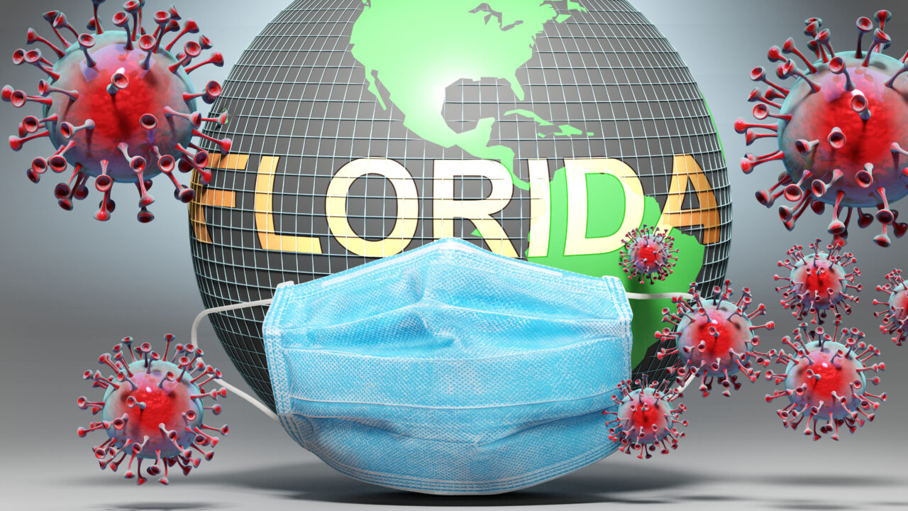 Florida and covid - Earth globe protected with a blue mask again