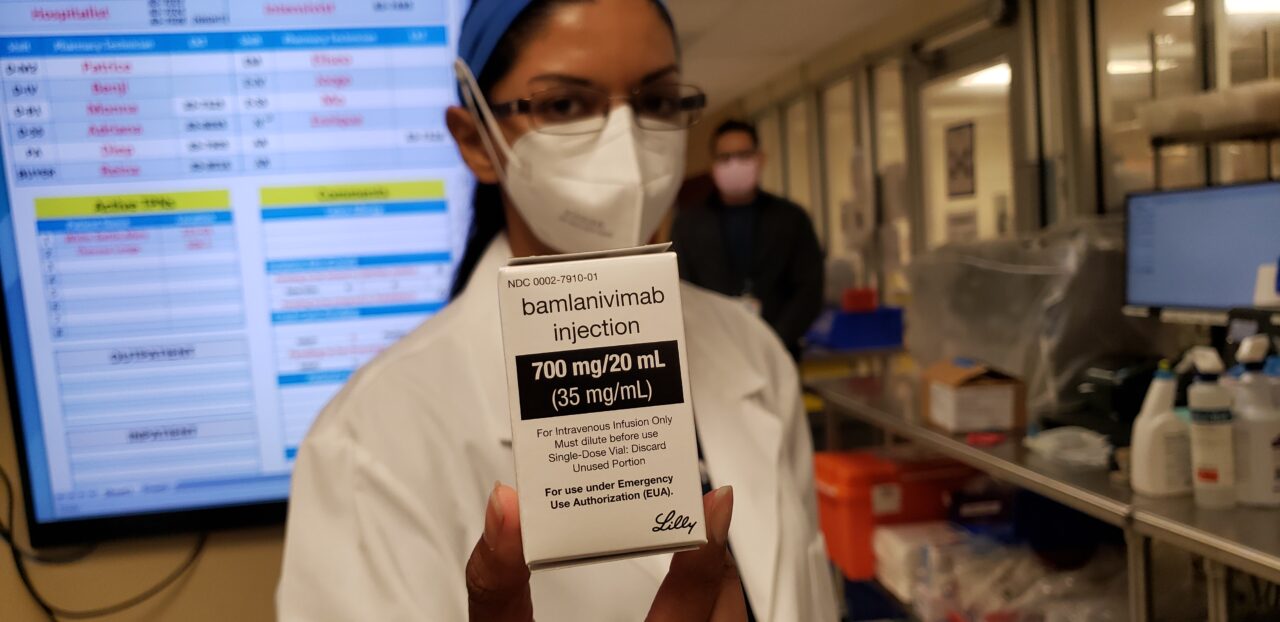 pharmacist holding monoclonal antibody infusion