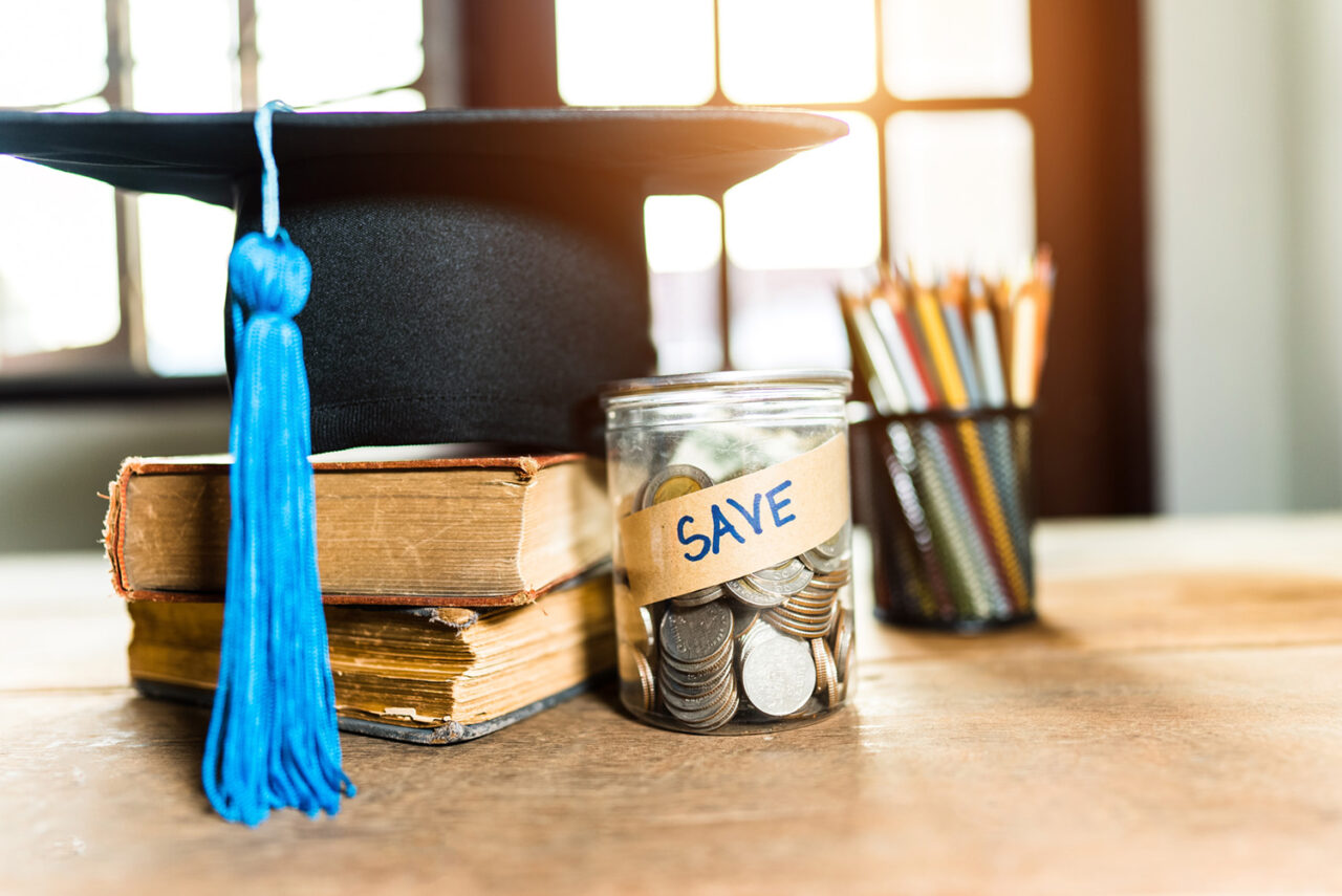 Education Savings Accounts, ESA, ESAs, tuition, hat graduation and money coins saving for concept investment education and scholarship