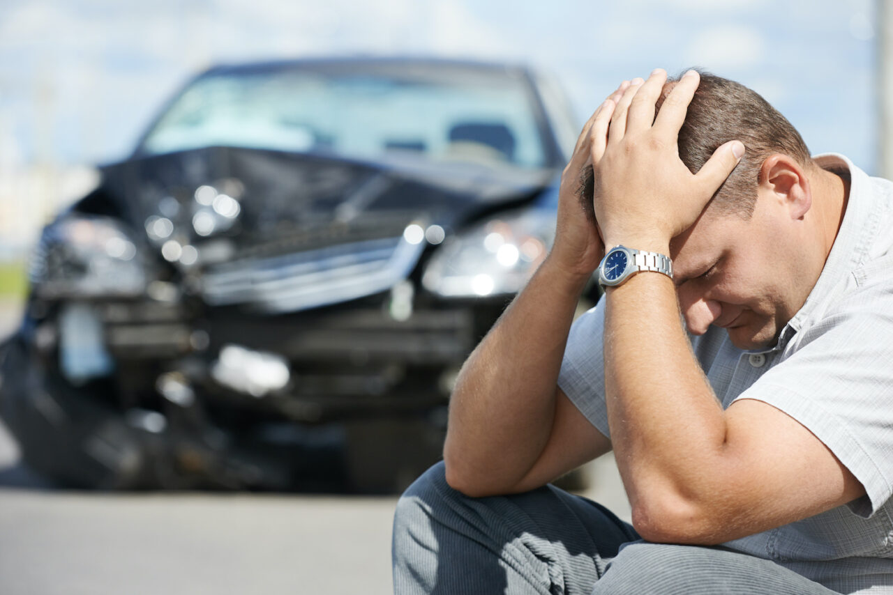 upset man after car crash