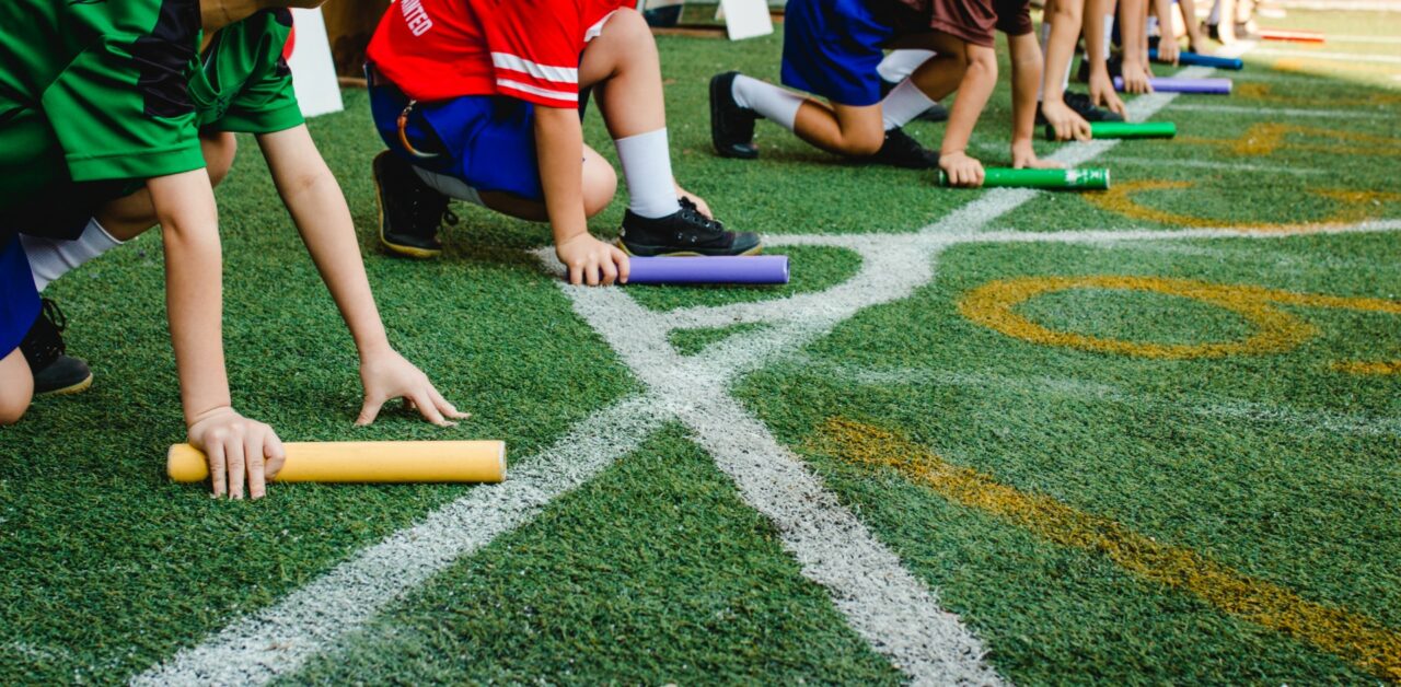 Students boy prepare to leaving the starting for relay race boy at school sports day. School sports day concept.