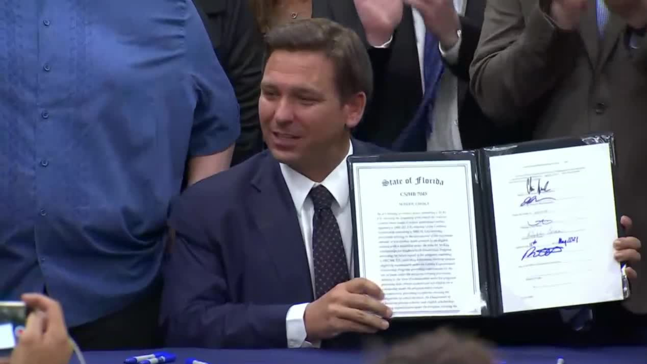 florida-gov. Ron DeSantis signs HB 7045 at St. John the Apostle Catholic School in Hialeah on May 11, 2021