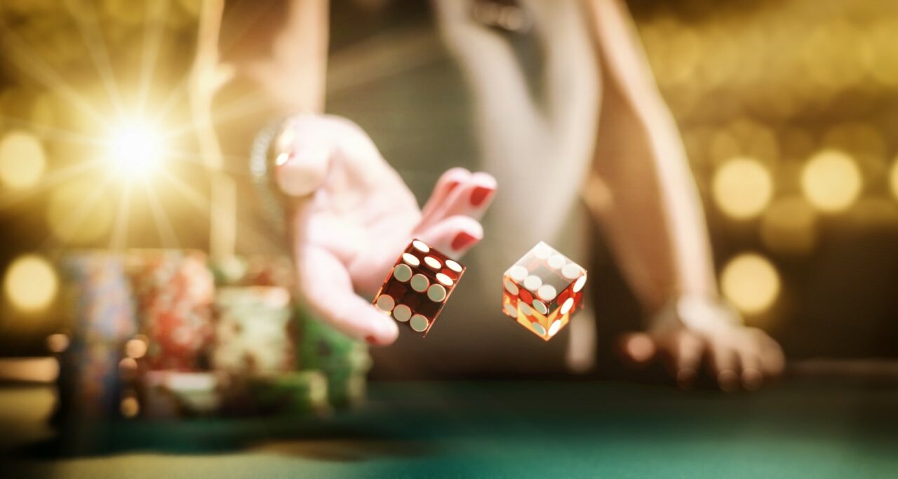 Man gambling at the craps table