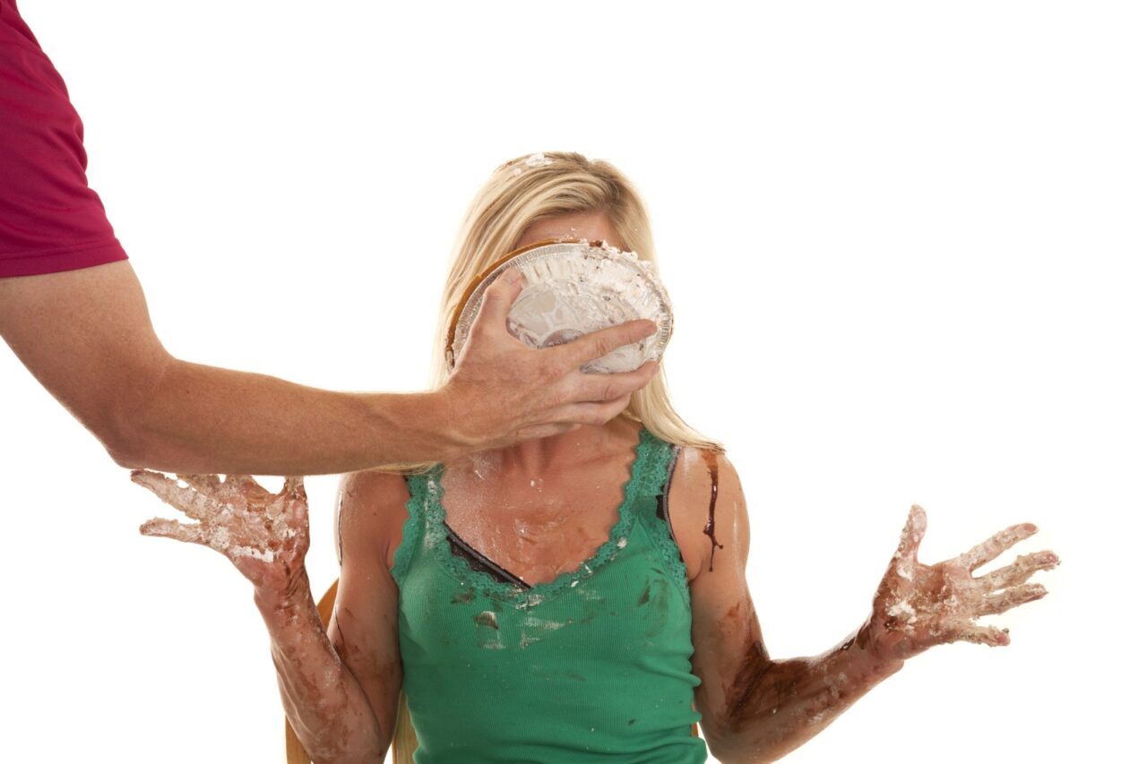 Woman with a pie in her face