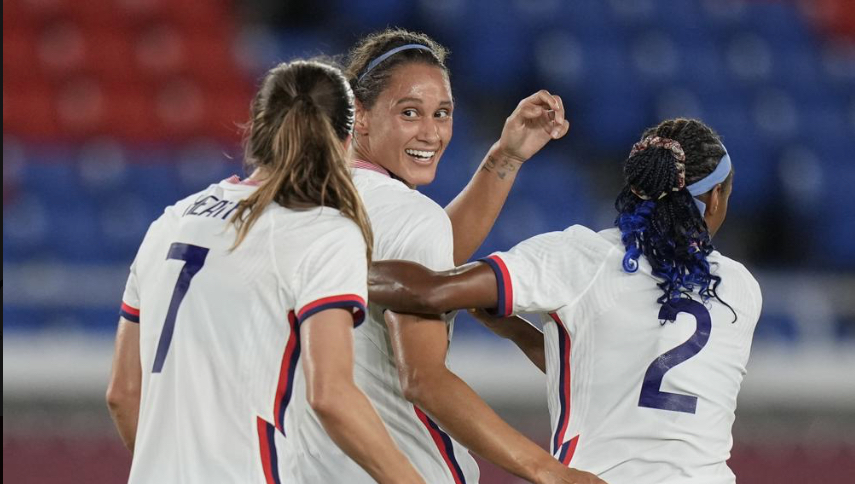 Lynn Williams, center, and U.S. Women's Soccer Team