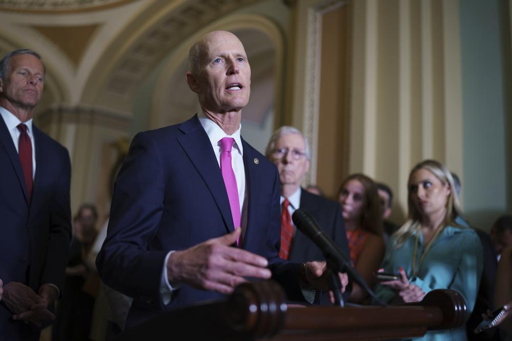 Rick Scott and Mitch McConnell