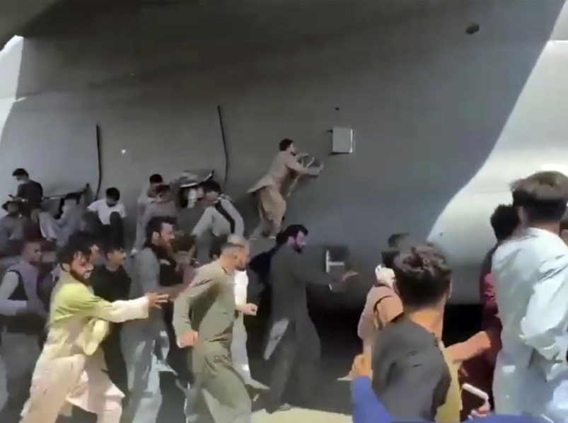 Afghans mob a departing U.S. Air Force C-17
