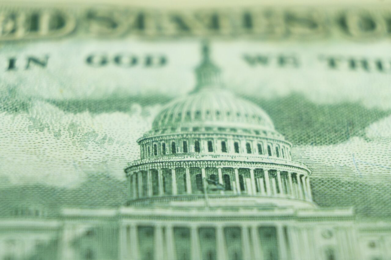 Imprint of the U.S. Capitol building on a dollar bill banknote