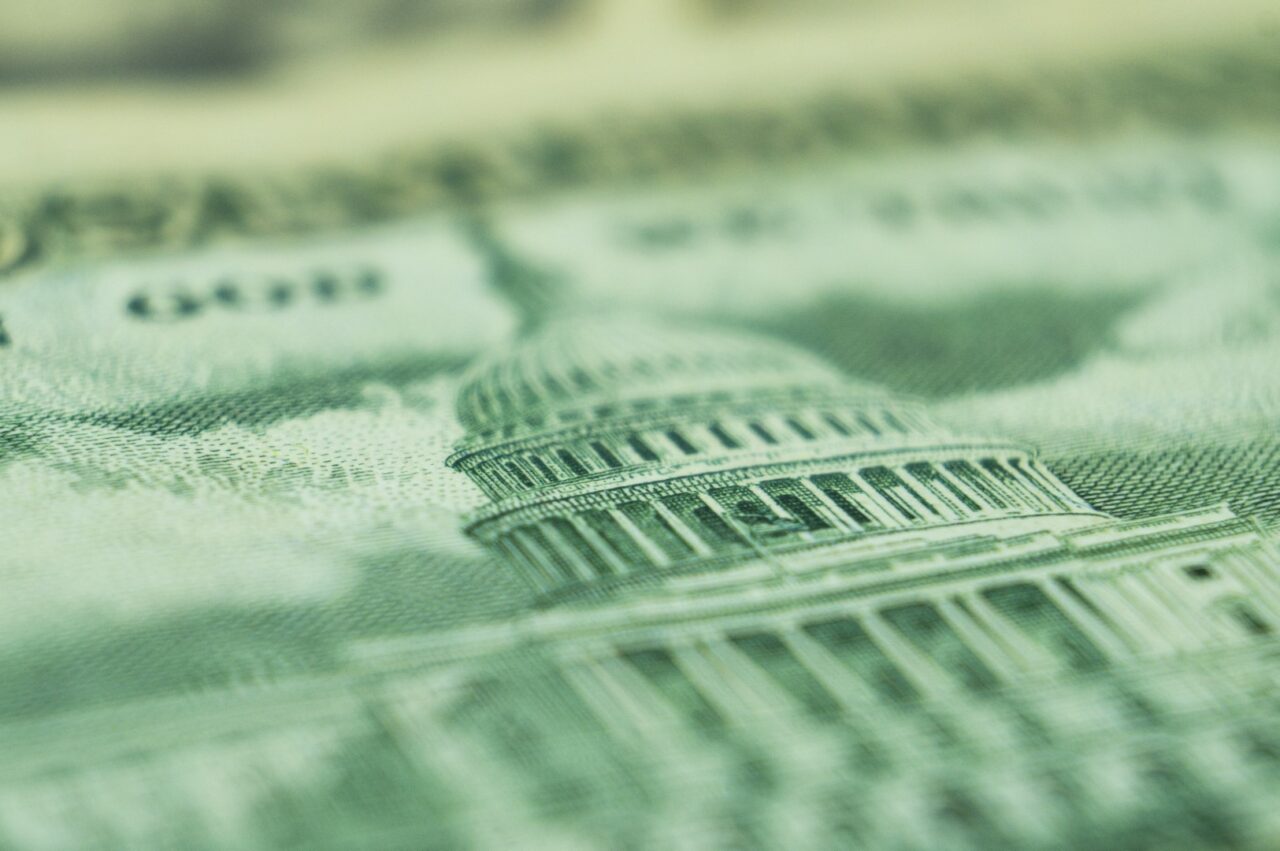 Imprint of the U.S. Capitol building on a dollar bill banknote