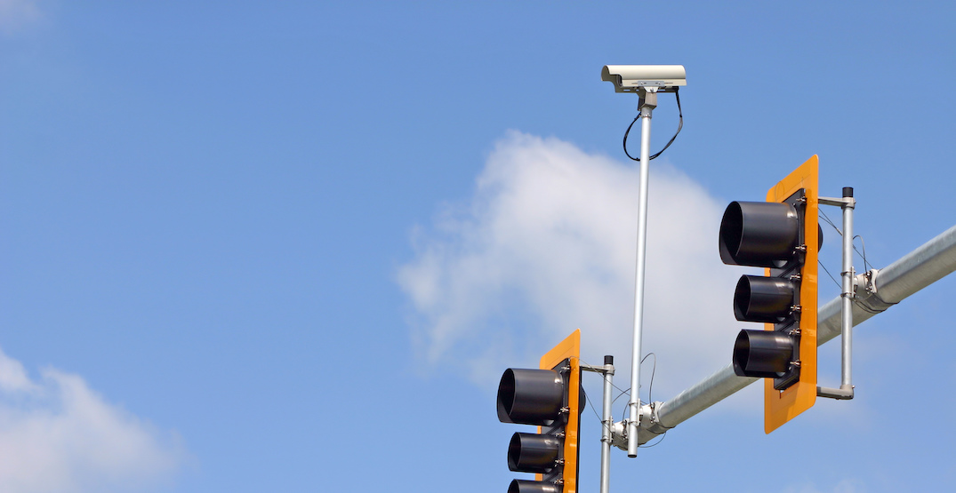 Secure,Camera,With,Traffic,Light,And,Sign.